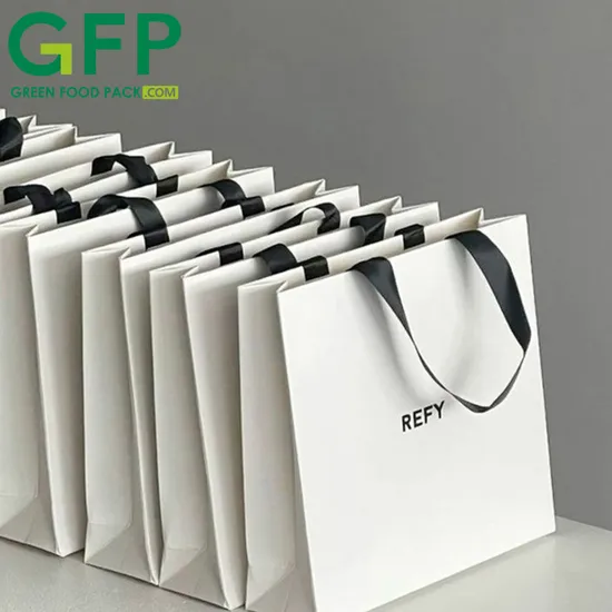 ODM OEM Custom Logo Luxury Paper Shopping Apparel Packaging Gift Shopping Bag Paper Bag with Die Cut Handle 